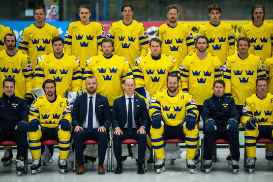 Payers and staff pose for a team photo
