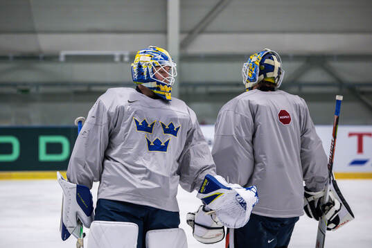 Goaltender Jesper Wallstedt and goaltender Samuel Ersson of