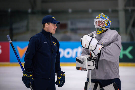 Head coach Sam Hallam and goaltender Samuel Ersson of