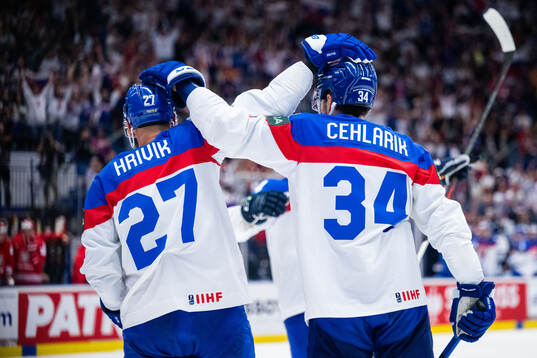 Marek Hrivik and Peter Cehlarik of Slovakia celebrate
