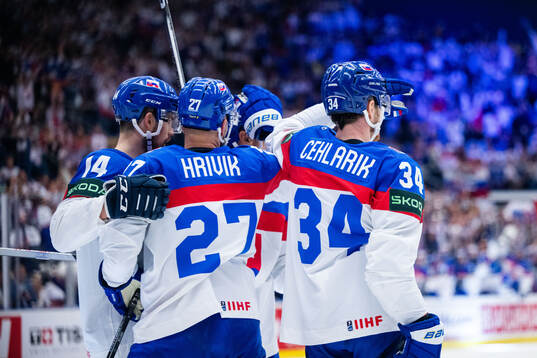 Marek Hrivik and Peter Cehlarik of Slovakia celebrate