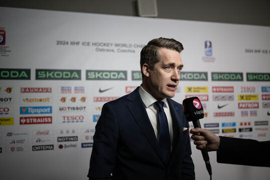 Head coach Sam Hallam of Sweden is interviewed by Swedish