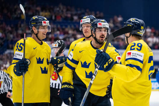 Marcus Johansson of Sweden celebrates with team mates