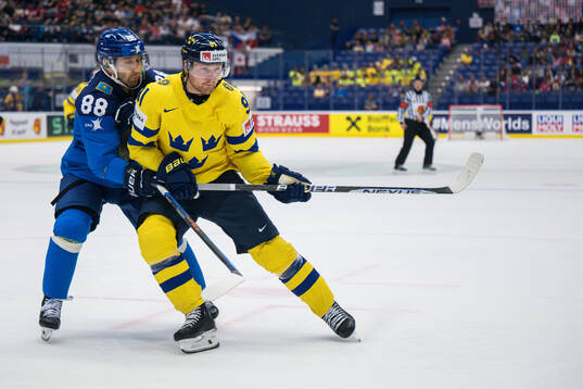 Yevgeniy Rymarev of Kazakhstan and Carl Grundström of