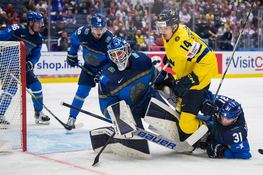 Goaltender Nikita Boyarkin and Artyom Korolyov against Joel