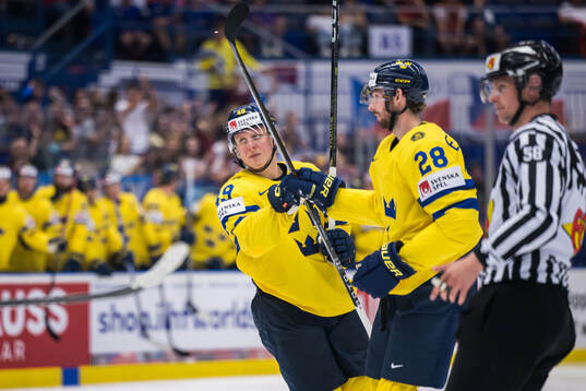 Fabian Zetterlund and Marcus Pettersson of Sweden celebrate