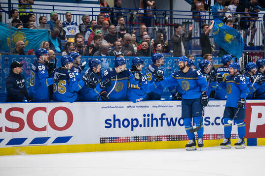 Adil Beketayev of Kazakhstan celebrates