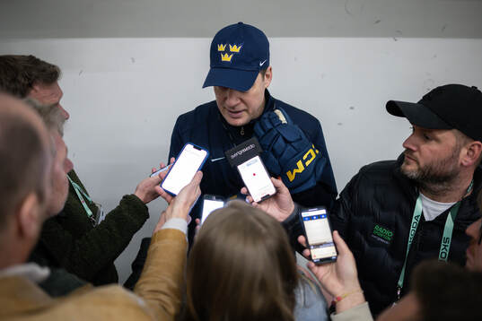 Head coach Sam Hallam of Sweden speaks with media
