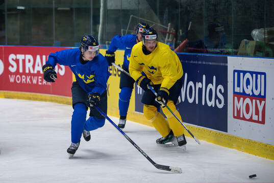 Felix Unger Sörum and Jonas Brodin of Sweden at a practice