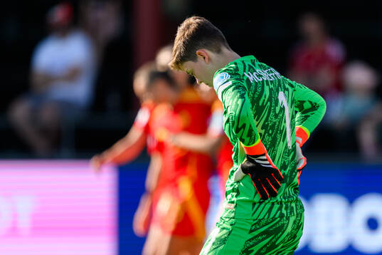 goalkeeper Hope Mcsheffrey of England looks dejecte