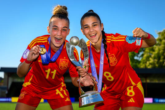 Irune Dorado and Folgado of Spain celebrate