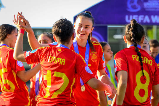 Players of Spain celebrate