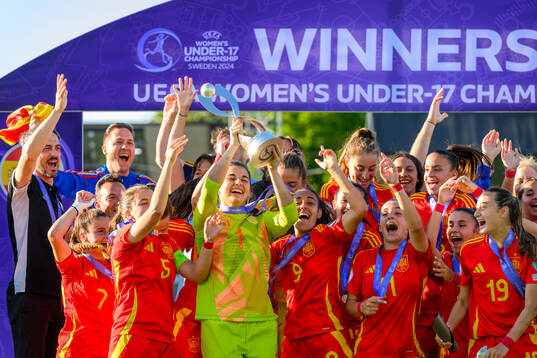 Players of Spain celebrate