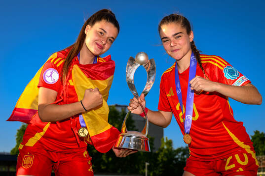 Nerea Carmona and Natalia Escot of Spain celebrate