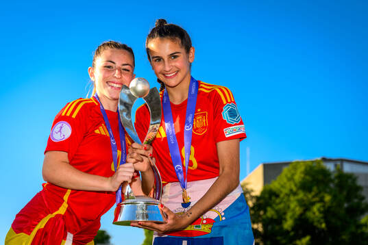 Claudia De La Cuerda and Lucia Rivas of Spain celebrate