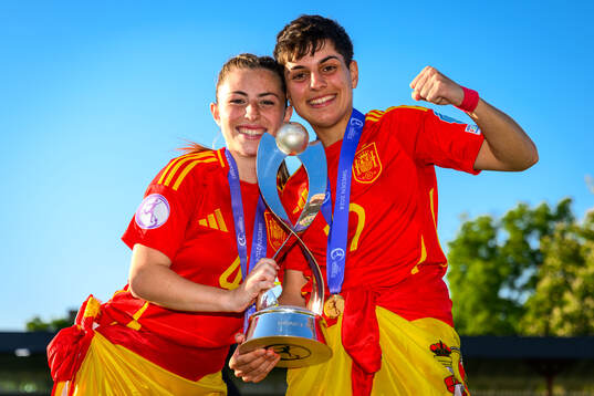 Claudia De La Cuerda and Emma Moreno of Spain celebrate