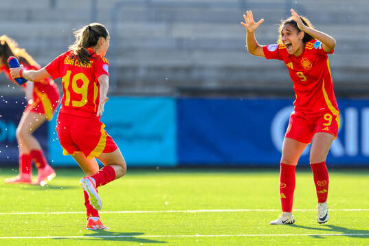 Alba Cerrato and Celia Segura of Spain celebrate