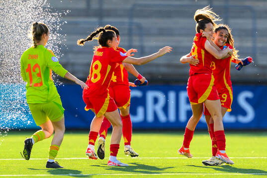 Alba Cerrato and Celia Segura of Spain celebrate