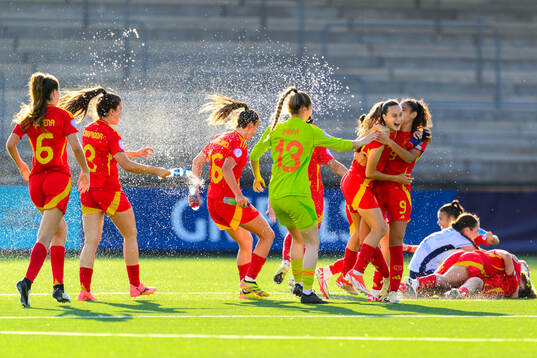 Alba Cerrato and Celia Segura of Spain celebrate