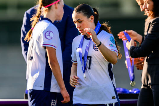 Eva Gray of England looks dejected