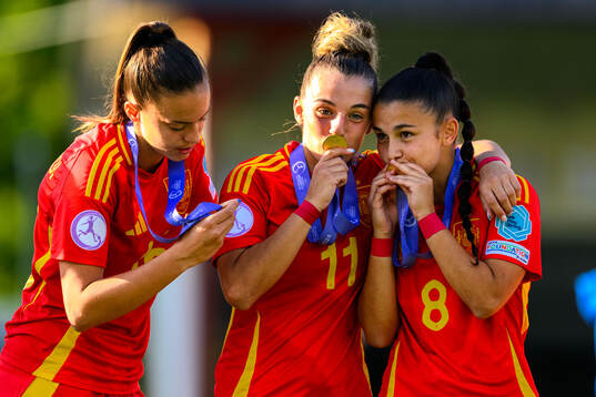Irune Dorado and Folgado of Spain celebrate