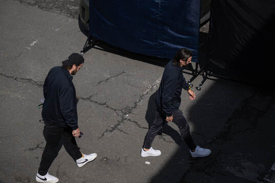 Victor Hedman and Erik Karlsson of Sweden arrive to the