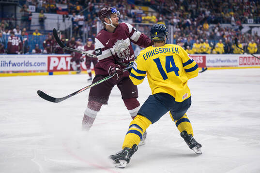 Markus Komuls of Latvia and Joel Eriksson Ek of Sweden