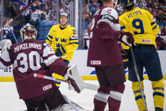Jonas Brodin of Sweden celebrates