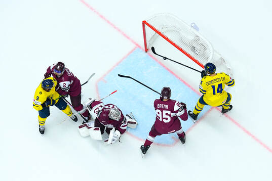 Adrian Kempe and Joel Eriksson Ek of Sweden against