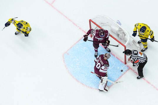 Lucas Raymond of Sweden (left) celebrates