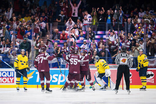 Players of Latvia celebrate