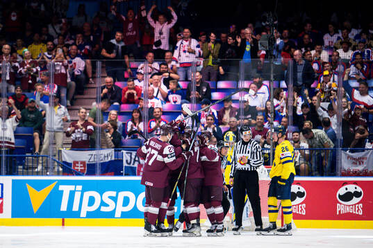 Players of Latvia celebrate