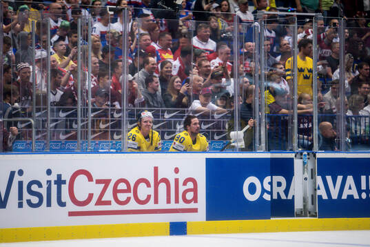Rasmus Dahlin and Marcus Johansson of Sweden in the penalty