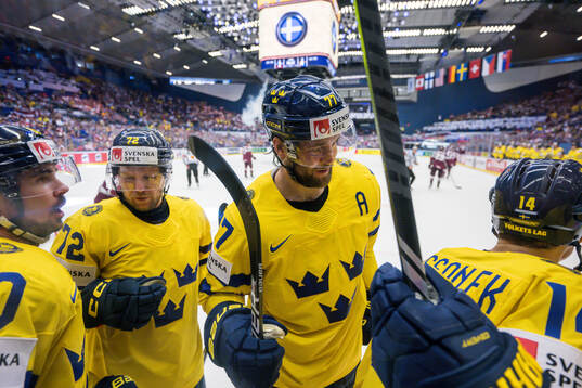 Victor Hedman and Joel Eriksson Ek of Sweden celebrate