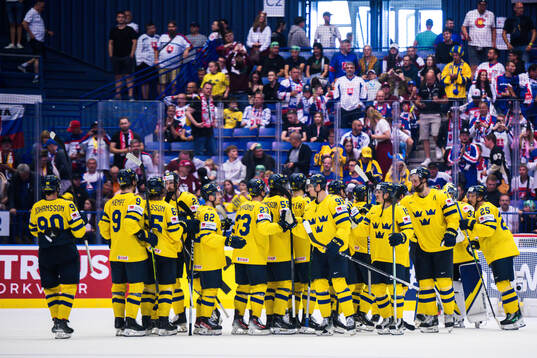 Players of Sweden celebrate