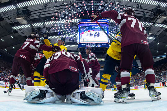 Rasmus Dahlin of Sweden and Martins Dzierkals of Latvia