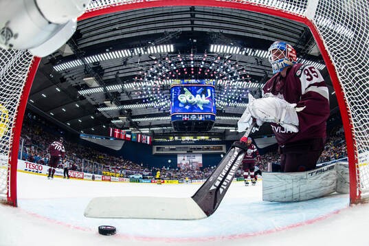 goaltender Kristers Gudlevskis of Latvia looks dejected
