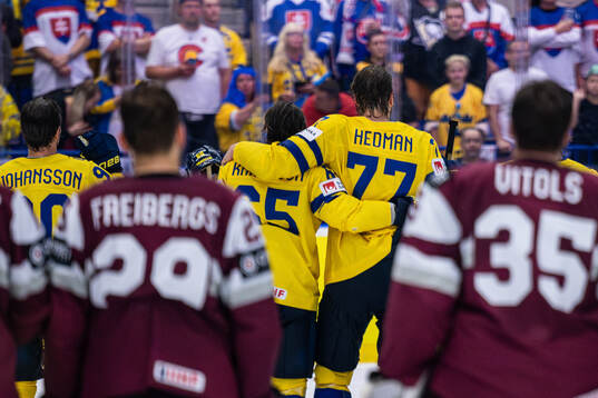 Erik Karlsson and Victor Hedman of Sweden embrace each other