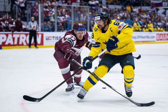 Roberts Kristaps Zile of Latvia and Erik Karlsson of Sweden