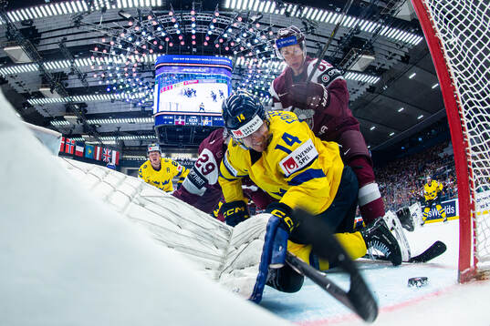 Joel Eriksson Ek of Sweden and Arvils Bergmanis of Latvia