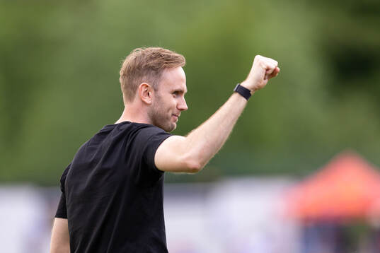 Kalmars tränare Henrik Jensen jublar