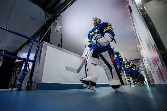 Goaltender Filip Gustavsson of Sweden enter the ice