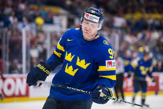 Carl Grundström of Sweden looks dejected