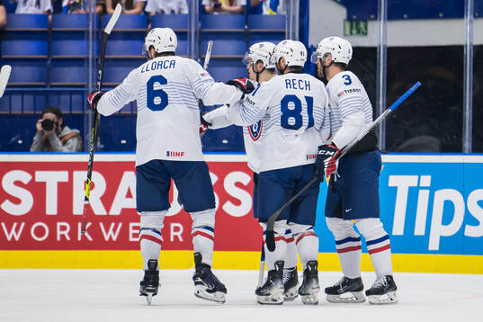 Charles Bertrand of France celebrate with team mates