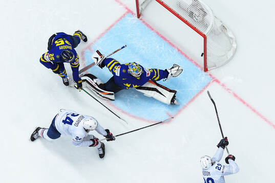 Goaltender Samuel Ersson of Sweden with a save against