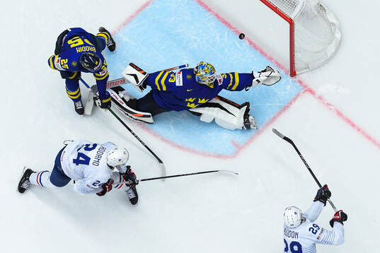 Goaltender Samuel Ersson of Sweden with a save against