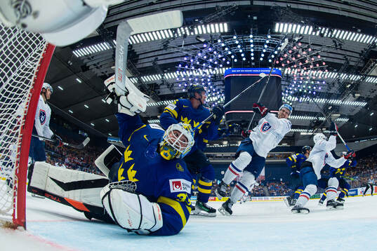Goaltender Samuel Ersson and Jonas Brodin of Sweden against