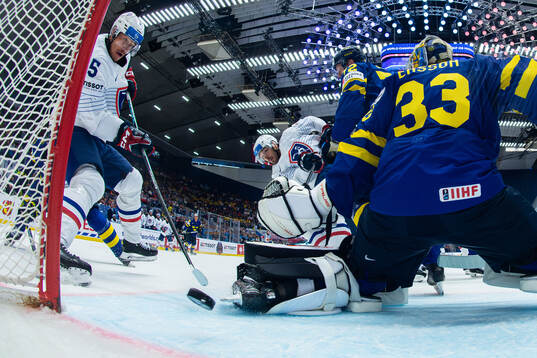 Charles Bertrand of France scores the 1-1 goal behind