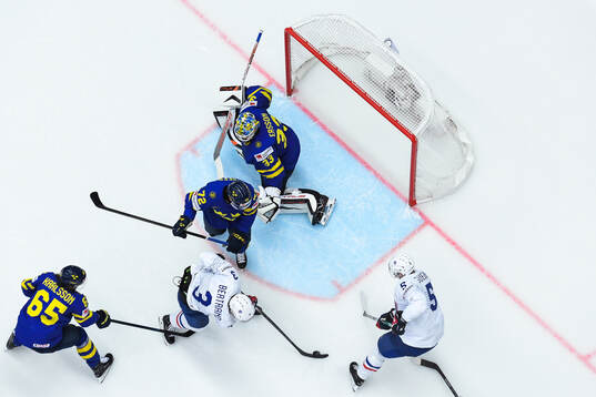 Charles Bertrand of France scores the 1-1 goal behind