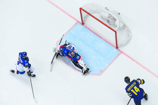 Lucas Raymond of Sweden (not pictured) scores 1-0 behind